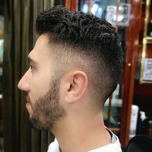 fade haircut by Plastiras 1955 barbershop